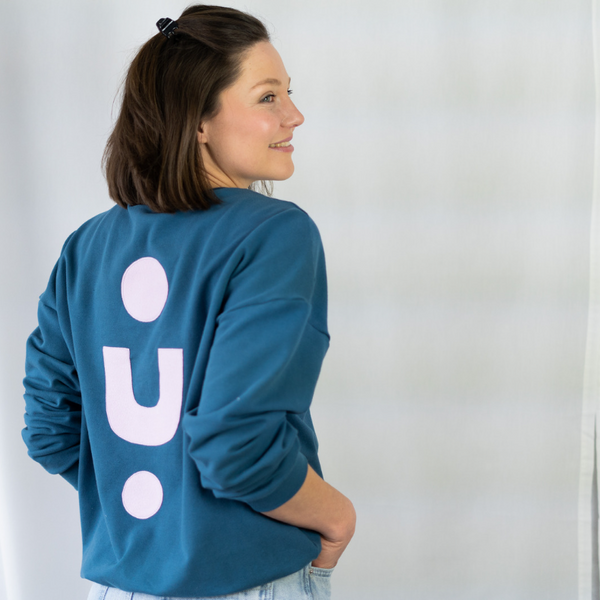 Frauen Sweater mit grafischer Applikation auf dem Rücken